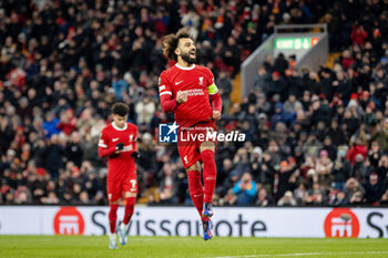 2023-11-30 - Liverpool forward Mohamed Salah (11) scores and celebrates 3-0 during the UEFA Europa League, Group E football match between Liverpool and LASK on 30 November 2023 at Anfield stadium in Liverpool, England - FOOTBALL - EUROPA LEAGUE - LIVERPOOL V LASK - UEFA EUROPA LEAGUE - SOCCER