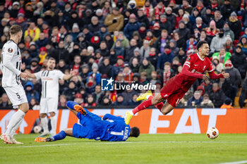 2023-11-30 - LASK Linz goalkeeper Tobias Lawal (1) fouls Liverpool forward Cody Gakpo (18) during the UEFA Europa League, Group E football match between Liverpool and LASK on 30 November 2023 at Anfield stadium in Liverpool, England - FOOTBALL - EUROPA LEAGUE - LIVERPOOL V LASK - UEFA EUROPA LEAGUE - SOCCER