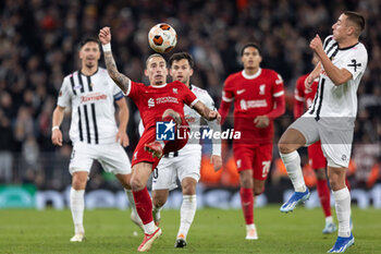 2023-11-30 - Liverpool defender Kostas Tsimikas (21) clears the ball during the UEFA Europa League, Group E football match between Liverpool and LASK on 30 November 2023 at Anfield stadium in Liverpool, England - FOOTBALL - EUROPA LEAGUE - LIVERPOOL V LASK - UEFA EUROPA LEAGUE - SOCCER