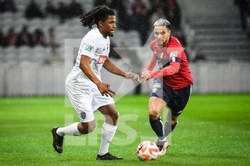 2023-01-08 - Yasser LAROUCI of ESTAC Troyes and Adam OUNAS of Lille during the French Cup, round of 64 football match between LOSC Lille and ESTAC Troyes on January 8, 2023 at Pierre Mauroy stadium in Villeneuve-d'Ascq, France - FOOTBALL - FRENCH CUP - LILLE V TROYES - FRENCH CUP - SOCCER