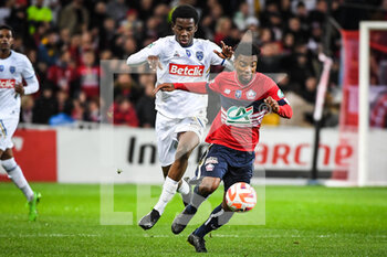 2023-01-08 - Derek MAZOU-SACKO of Troyes and Angel GOMES of Lille during the French Cup, round of 64 football match between LOSC Lille and ESTAC Troyes on January 8, 2023 at Pierre Mauroy stadium in Villeneuve-d'Ascq, France - FOOTBALL - FRENCH CUP - LILLE V TROYES - FRENCH CUP - SOCCER