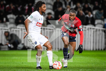 2023-01-08 - Yasser LAROUCI of ESTAC Troyes and Bafode DIAKITE of Lille during the French Cup, round of 64 football match between LOSC Lille and ESTAC Troyes on January 8, 2023 at Pierre Mauroy stadium in Villeneuve-d'Ascq, France - FOOTBALL - FRENCH CUP - LILLE V TROYES - FRENCH CUP - SOCCER