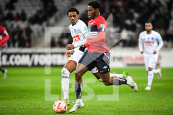 2023-01-08 - Amar Ahmed FATAH of ESTAC Troyes and Jonathan DAVID of Lille during the French Cup, round of 64 football match between LOSC Lille and ESTAC Troyes on January 8, 2023 at Pierre Mauroy stadium in Villeneuve-d'Ascq, France - FOOTBALL - FRENCH CUP - LILLE V TROYES - FRENCH CUP - SOCCER
