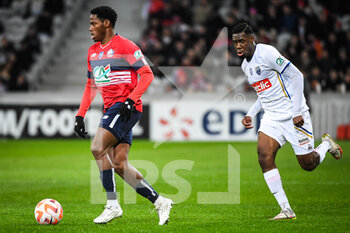 2023-01-08 - Jonathan DAVID of Lille and Rudy KOHON of ESTAC Troyes during the French Cup, round of 64 football match between LOSC Lille and ESTAC Troyes on January 8, 2023 at Pierre Mauroy stadium in Villeneuve-d'Ascq, France - FOOTBALL - FRENCH CUP - LILLE V TROYES - FRENCH CUP - SOCCER
