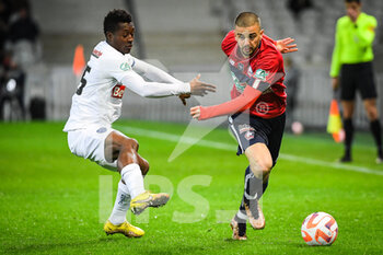 2023-01-08 - Marlos MORENO of ESTAC Troyes and Edon ZHEGROVA of Lille during the French Cup, round of 64 football match between LOSC Lille and ESTAC Troyes on January 8, 2023 at Pierre Mauroy stadium in Villeneuve-d'Ascq, France - FOOTBALL - FRENCH CUP - LILLE V TROYES - FRENCH CUP - SOCCER