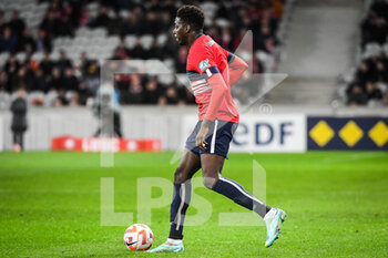 2023-01-08 - Mohamed BAYO of Lille during the French Cup, round of 64 football match between LOSC Lille and ESTAC Troyes on January 8, 2023 at Pierre Mauroy stadium in Villeneuve-d'Ascq, France - FOOTBALL - FRENCH CUP - LILLE V TROYES - FRENCH CUP - SOCCER