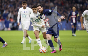 2023-02-08 - Lionel Messi of PSG, Alexis Sanchez of Marseille (left) during the French Cup round of 16 football match between Olympique de Marseille (OM) and Paris Saint-Germain (PSG) on February 8, 2023 at Stade Velodrome in Marseille, France - FOOTBALL - FRENCH CUP - MARSEILLE V PARIS SG - FRENCH CUP - SOCCER
