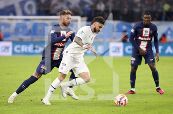2023-02-09 - Jonathan Clauss of Marseille, Sergio Ramos of PSG (left) during the French Cup round of 16 football match between Olympique de Marseille (OM) and Paris Saint-Germain (PSG) on February 8, 2023 at Stade Velodrome in Marseille, France - FOOTBALL - FRENCH CUP - MARSEILLE V PARIS SG - FRENCH CUP - SOCCER