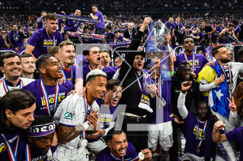 2023-04-29 - Team of Toulouse and Philippe MONTANIER of Toulouse celebrate his victory with the trophy during the French Cup Final match between FC Nantes and Toulouse FC at Stade de France on April 29, 2023 in Saint-Denis near Paris, France. - FOOTBALL - FRENCH CUP - FINAL - NANTES V TOULOUSE - FRENCH CUP - SOCCER