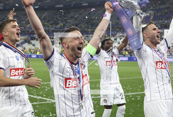 2023-04-29 - Brecht Dejaegere, Branco Van Den Boomen of Toulouse celebrate the victory following the French Cup Final 2023 football match between FC Nantes and Toulouse FC (TFC, Tefece) on April 29, 2023 at Stade de France in Saint-Denis near Paris, France - FOOTBALL - FRENCH CUP - FINAL - NANTES V TOULOUSE - FRENCH CUP - SOCCER