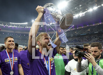 2023-04-29 - Mikkel Desler Puggaard of Toulouse celebrates the victory following the French Cup Final 2023 football match between FC Nantes and Toulouse FC (TFC, Tefece) on April 29, 2023 at Stade de France in Saint-Denis near Paris, France - FOOTBALL - FRENCH CUP - FINAL - NANTES V TOULOUSE - FRENCH CUP - SOCCER