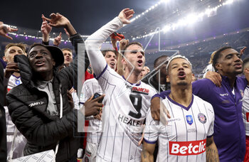 2023-04-29 - Branco Van Den Boomen, Rafael Ratao of Toulouse celebrate the victory following the French Cup Final 2023 football match between FC Nantes and Toulouse FC (TFC, Tefece) on April 29, 2023 at Stade de France in Saint-Denis near Paris, France - FOOTBALL - FRENCH CUP - FINAL - NANTES V TOULOUSE - FRENCH CUP - SOCCER