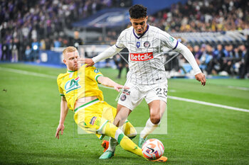 2023-04-29 - Florent MOLLET of Nantes and Fares CHAIBI of Toulouse during the French Cup, Final football match between FC Nantes and Toulouse FC on April 29, 2023 at Stade de France in Saint-Denis near Paris, France - FOOTBALL - FRENCH CUP - FINAL - NANTES V TOULOUSE - FRENCH CUP - SOCCER