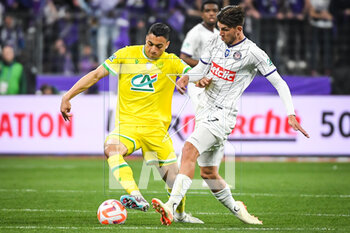 2023-04-29 - Mostafa MOHAMED of Nantes and Stijn SPIERINGS of Toulouse during the French Cup, Final football match between FC Nantes and Toulouse FC on April 29, 2023 at Stade de France in Saint-Denis near Paris, France - FOOTBALL - FRENCH CUP - FINAL - NANTES V TOULOUSE - FRENCH CUP - SOCCER