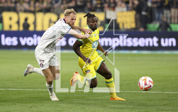 2023-04-29 - Mikkel Desler Puggaard of Toulouse, Moses Simon of Nantes during the French Cup Final 2023 football match between FC Nantes and Toulouse FC (TFC, Tefece) on April 29, 2023 at Stade de France in Saint-Denis near Paris, France - FOOTBALL - FRENCH CUP - FINAL - NANTES V TOULOUSE - FRENCH CUP - SOCCER