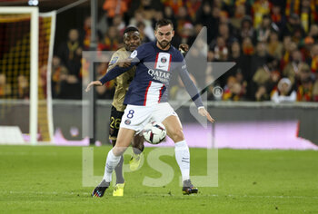 2023-01-01 - Fabian Ruiz Pena of PSG, Salis Abdul Samed of Lens (left) during the French championship Ligue 1 football match between RC Lens and Paris Saint-Germain on January 1, 2023 at Bollaert-Delelis stadium in Lens, France - FOOTBALL - FRENCH CHAMP - LENS V PARIS SG - FRENCH LIGUE 1 - SOCCER