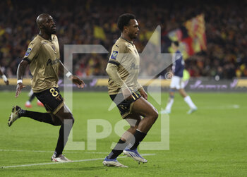 2023-01-01 - Lois Openda of Lens celebrates his goal with Seko Fofana (left) during the French championship Ligue 1 football match between RC Lens and Paris Saint-Germain on January 1, 2023 at Bollaert-Delelis stadium in Lens, France - FOOTBALL - FRENCH CHAMP - LENS V PARIS SG - FRENCH LIGUE 1 - SOCCER