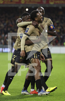 2023-01-01 - Lois Openda of Lens celebrates his goal with teammates during the French championship Ligue 1 football match between RC Lens and Paris Saint-Germain on January 1, 2023 at Bollaert-Delelis stadium in Lens, France - FOOTBALL - FRENCH CHAMP - LENS V PARIS SG - FRENCH LIGUE 1 - SOCCER