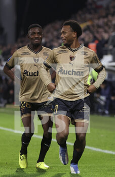 2023-01-01 - Lois Openda of Lens celebrates his goal with Salis Abdul Samed (left) during the French championship Ligue 1 football match between RC Lens and Paris Saint-Germain on January 1, 2023 at Bollaert-Delelis stadium in Lens, France - FOOTBALL - FRENCH CHAMP - LENS V PARIS SG - FRENCH LIGUE 1 - SOCCER