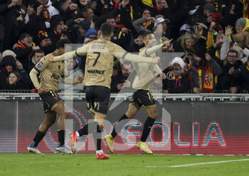 2023-01-01 - Alexis Claude Maurice of Lens celebrates his goal with teammates during the French championship Ligue 1 football match between RC Lens and Paris Saint-Germain on January 1, 2023 at Bollaert-Delelis stadium in Lens, France - FOOTBALL - FRENCH CHAMP - LENS V PARIS SG - FRENCH LIGUE 1 - SOCCER