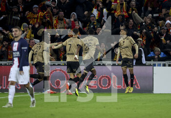 2023-01-01 - Alexis Claude Maurice of Lens (R) celebrates his goal with teammates during the French championship Ligue 1 football match between RC Lens and Paris Saint-Germain on January 1, 2023 at Bollaert-Delelis stadium in Lens, France - FOOTBALL - FRENCH CHAMP - LENS V PARIS SG - FRENCH LIGUE 1 - SOCCER