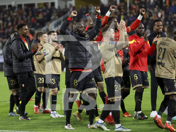 2023-01-01 - Seko Fofana of Lens and teammates celebrate the victory following the French championship Ligue 1 football match between RC Lens and Paris Saint-Germain on January 1, 2023 at Bollaert-Delelis stadium in Lens, France - FOOTBALL - FRENCH CHAMP - LENS V PARIS SG - FRENCH LIGUE 1 - SOCCER