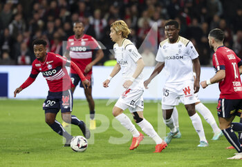 02/01/2023 - Ito Junya of Reims, Angel Gomes of Lille (left) during the French championship Ligue 1 football match between LOSC Lille (LOSC) and Stade de Reims on January 2, 2023 at Stade Pierre Mauroy in Villeneuve-d'Ascq near Lille, France - FOOTBALL - FRENCH CHAMP - LILLE V REIMS - FRENCH LIGUE 1 - CALCIO