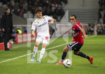 02/01/2023 - Thomas Foket of Reims, Ismaily Goncalves Santos of Lille during the French championship Ligue 1 football match between LOSC Lille (LOSC) and Stade de Reims on January 2, 2023 at Stade Pierre Mauroy in Villeneuve-d'Ascq near Lille, France - FOOTBALL - FRENCH CHAMP - LILLE V REIMS - FRENCH LIGUE 1 - CALCIO