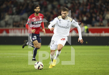 02/01/2023 - Arber Zeneli of Reims during the French championship Ligue 1 football match between LOSC Lille (LOSC) and Stade de Reims on January 2, 2023 at Stade Pierre Mauroy in Villeneuve-d'Ascq near Lille, France - FOOTBALL - FRENCH CHAMP - LILLE V REIMS - FRENCH LIGUE 1 - CALCIO