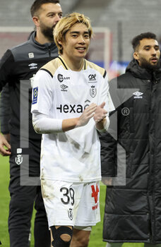 02/01/2023 - Ito Junya of Reims salutes the supporters following the French championship Ligue 1 football match between LOSC Lille (LOSC) and Stade de Reims on January 2, 2023 at Stade Pierre Mauroy in Villeneuve-d'Ascq near Lille, France - FOOTBALL - FRENCH CHAMP - LILLE V REIMS - FRENCH LIGUE 1 - CALCIO