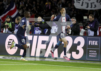 2023-01-11 - Hugo Ekitike of PSG celebrates his goal with Nordi Mukiele (left) during the French championship Ligue 1 football match between Paris Saint-Germain (PSG) and SCO Angers on January 11, 2023 at Parc des Princes stadium in Paris, France - FOOTBALL - FRENCH CHAMP - PARIS SG V ANGERS - FRENCH LIGUE 1 - SOCCER