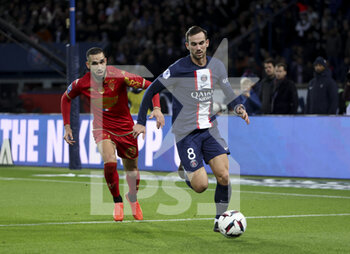 2023-01-11 - Fabian Ruiz Pena of PSG, Nabil Bentaleb of Angers (left) during the French championship Ligue 1 football match between Paris Saint-Germain (PSG) and SCO Angers on January 11, 2023 at Parc des Princes stadium in Paris, France - FOOTBALL - FRENCH CHAMP - PARIS SG V ANGERS - FRENCH LIGUE 1 - SOCCER