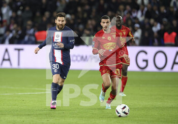 2023-01-11 - Lionel Messi of PSG, Waniss Taibi of Angers during the French championship Ligue 1 football match between Paris Saint-Germain (PSG) and SCO Angers on January 11, 2023 at Parc des Princes stadium in Paris, France - FOOTBALL - FRENCH CHAMP - PARIS SG V ANGERS - FRENCH LIGUE 1 - SOCCER