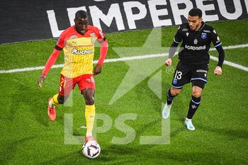 2023-01-14 - Massadio HAIDARA of Lens and Akim ZEDADKA of Auxerre during the French championship Ligue 1 football match between RC Lens and AJ Auxerre on January 14, 2023 at Bollaert-Delelis stadium in Lens, France - FOOTBALL - FRENCH CHAMP - LENS V AUXERRE - FRENCH LIGUE 1 - SOCCER