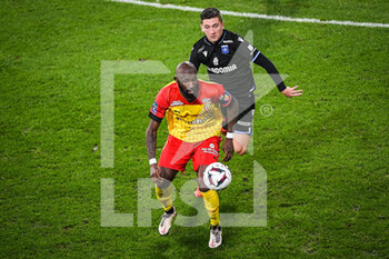 2023-01-14 - Seko FOFANA of Lens and Mathias AUTRET of Auxerre during the French championship Ligue 1 football match between RC Lens and AJ Auxerre on January 14, 2023 at Bollaert-Delelis stadium in Lens, France - FOOTBALL - FRENCH CHAMP - LENS V AUXERRE - FRENCH LIGUE 1 - SOCCER