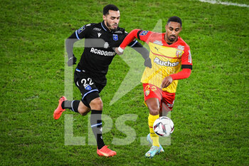 2023-01-14 - Hamza SAKHI of Auxerre and Wesley SAID of Lens during the French championship Ligue 1 football match between RC Lens and AJ Auxerre on January 14, 2023 at Bollaert-Delelis stadium in Lens, France - FOOTBALL - FRENCH CHAMP - LENS V AUXERRE - FRENCH LIGUE 1 - SOCCER