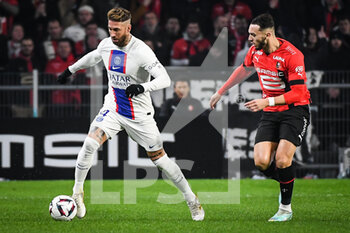 2023-01-15 - Sergio RAMOS of PSG and Amine GOUIRI of Rennes during the French championship Ligue 1 football match between Stade Rennais and Paris Saint-Germain on January 15, 2023 at Roazhon Park in Rennes, France - FOOTBALL - FRENCH CHAMP - RENNES V PARIS SG - FRENCH LIGUE 1 - SOCCER