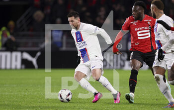 2023-01-15 - Lionel Messi of PSG, Arnaud Kalimuendo of Rennes during the French championship Ligue 1 football match between Stade Rennais and Paris Saint-Germain on January 15, 2023 at Roazhon Park in Rennes, France - FOOTBALL - FRENCH CHAMP - RENNES V PARIS SG - FRENCH LIGUE 1 - SOCCER