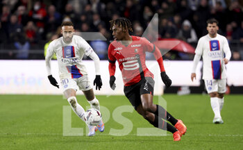 2023-01-15 - Christopher Wooh of Rennes, Neymar Jr of PSG (left) during the French championship Ligue 1 football match between Stade Rennais and Paris Saint-Germain on January 15, 2023 at Roazhon Park in Rennes, France - FOOTBALL - FRENCH CHAMP - RENNES V PARIS SG - FRENCH LIGUE 1 - SOCCER