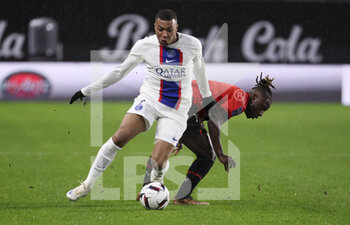 2023-01-15 - Kylian Mbappe of PSG, Lesley Ugochukwu of Rennes during the French championship Ligue 1 football match between Stade Rennais and Paris Saint-Germain on January 15, 2023 at Roazhon Park in Rennes, France - FOOTBALL - FRENCH CHAMP - RENNES V PARIS SG - FRENCH LIGUE 1 - SOCCER