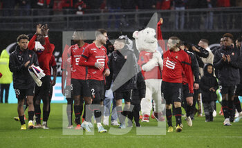 2023-01-15 - Players of Rennes celebrate the victory following the French championship Ligue 1 football match between Stade Rennais and Paris Saint-Germain on January 15, 2023 at Roazhon Park in Rennes, France - FOOTBALL - FRENCH CHAMP - RENNES V PARIS SG - FRENCH LIGUE 1 - SOCCER