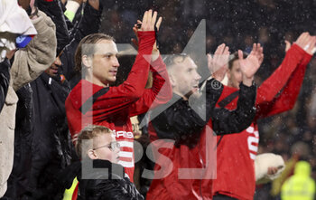 2023-01-15 - Lovro Majer of Rennes and teammates celebrate the victory following the French championship Ligue 1 football match between Stade Rennais and Paris Saint-Germain on January 15, 2023 at Roazhon Park in Rennes, France - FOOTBALL - FRENCH CHAMP - RENNES V PARIS SG - FRENCH LIGUE 1 - SOCCER