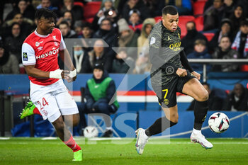 2023-01-29 - Emmanuel AGBADOU of Reims and Kylian MBAPPE of PSG during the French championship Ligue 1 football match between Paris Saint-Germain and Stade de Reims on January 29, 2023 at Parc des Princes stadium in Paris, France - FOOTBALL - FRENCH CHAMP - PARIS SG V REIMS - FRENCH LIGUE 1 - SOCCER