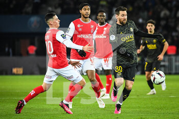2023-01-29 - Alexis FLIPS of Reims, Jens CAJUSTE of Reims and Lionel (Leo) MESSI of PSG during the French championship Ligue 1 football match between Paris Saint-Germain and Stade de Reims on January 29, 2023 at Parc des Princes stadium in Paris, France - FOOTBALL - FRENCH CHAMP - PARIS SG V REIMS - FRENCH LIGUE 1 - SOCCER
