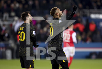2023-01-30 - Neymar Jr of PSG celebrates his goal with Lionel Messi (left) during the French championship Ligue 1 football match between Paris Saint-Germain (PSG) and Stade de Reims on January 29, 2023 at Parc des Princes stadium in Paris, France - FOOTBALL - FRENCH CHAMP - PARIS SG V REIMS - FRENCH LIGUE 1 - SOCCER