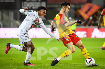 2023-02-01 - Hicham BOUDAOUI of Nice and Adrien THOMASSON of Lens during the French championship Ligue 1 football match between RC Lens and OGC Nice on February 1, 2023 at Bollaert-Delelis stadium in Lens, France - FOOTBALL - FRENCH CHAMP - LENS V NICE - FRENCH LIGUE 1 - SOCCER