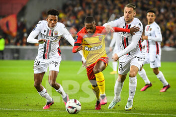 2023-02-01 - Hicham BOUDAOUI of Nice, David PEREIRA DA COSTA of Lens and Aaron RAMSEY of Nice during the French championship Ligue 1 football match between RC Lens and OGC Nice on February 1, 2023 at Bollaert-Delelis stadium in Lens, France - FOOTBALL - FRENCH CHAMP - LENS V NICE - FRENCH LIGUE 1 - SOCCER