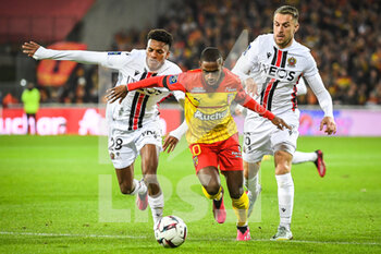 2023-02-01 - Hicham BOUDAOUI of Nice, David PEREIRA DA COSTA of Lens and Aaron RAMSEY of Nice during the French championship Ligue 1 football match between RC Lens and OGC Nice on February 1, 2023 at Bollaert-Delelis stadium in Lens, France - FOOTBALL - FRENCH CHAMP - LENS V NICE - FRENCH LIGUE 1 - SOCCER