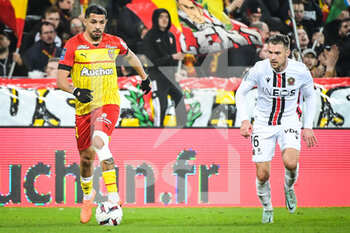 2023-02-01 - Facundo Axel MEDINA of Lens and Aaron RAMSEY of Nice during the French championship Ligue 1 football match between RC Lens and OGC Nice on February 1, 2023 at Bollaert-Delelis stadium in Lens, France - FOOTBALL - FRENCH CHAMP - LENS V NICE - FRENCH LIGUE 1 - SOCCER
