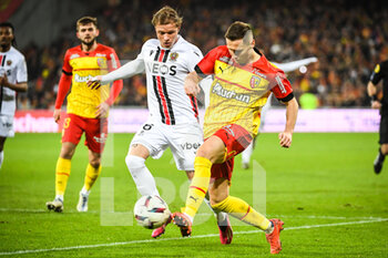 2023-02-01 - Melvin BARB of Nice and Przemyslaw Adam FRANKOWSKI of Lens during the French championship Ligue 1 football match between RC Lens and OGC Nice on February 1, 2023 at Bollaert-Delelis stadium in Lens, France - FOOTBALL - FRENCH CHAMP - LENS V NICE - FRENCH LIGUE 1 - SOCCER